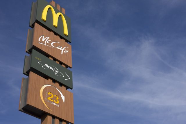 McDonald's sign against blue sky